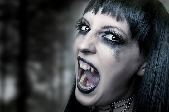 Halloween horror concept. Night woman vampire
