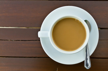 Coffee cup on wood table