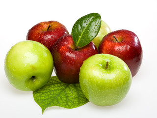 red and green wet apples on white background on the leaf