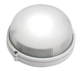 The round white lamp is shone. Isolated on a white background