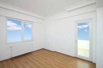 Empty room with a window and the balcony