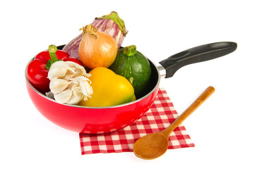 Red frying pan with ratatouille vegetables