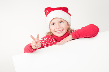 Little Santa Claus helper with white board  ( copy space)