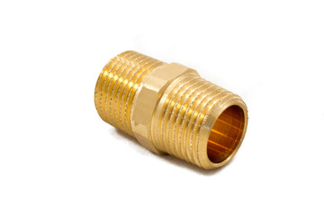 Double threaded brass pipe fitting isolated on white