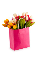 Tulips in the bag isolated on white