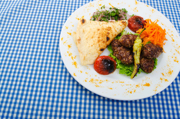 Meat cuisine - kebab served in plate