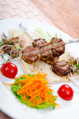 Meat cuisine - kebab served in plate