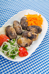 Baked potatoes in the plate