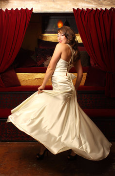 Beautiful Woman Dancing In A Flowy White Dress.