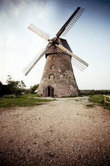 Fototapeta na wymiar Traditional Old dutch windmill in Latvia