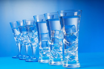 Water in the glass against gradient background