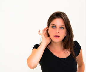 Relying on hand-ear listening young woman