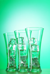 Glasses of water against gradient background
