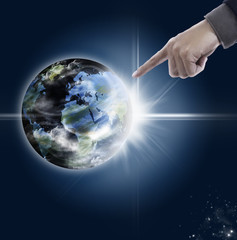 businessman point finger to the world