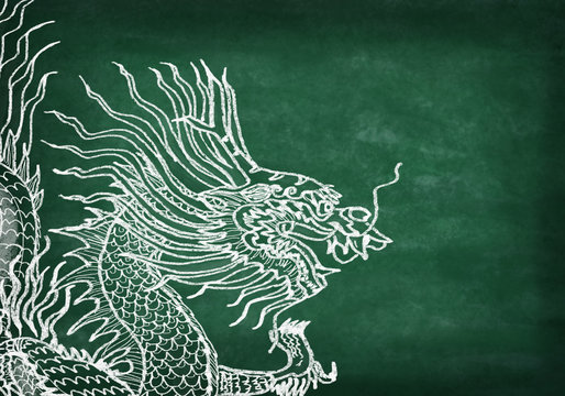 dragon ,drawing with chalk on chalkboard