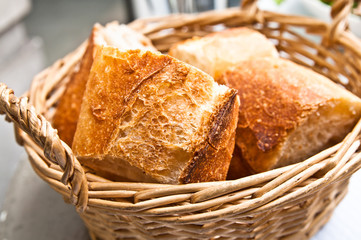 bread in basket - little roll breads in basket on table