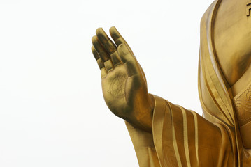 main de la statue de bouddha doré