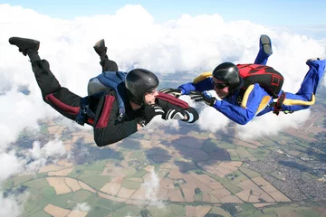 Foto op Plexiglas Twee parachutisten in vrije val © Joggie Botma