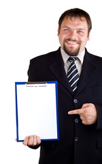 Businessman showing on clipboard