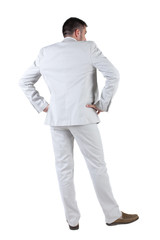 Businessman looks ahead. rear view. Isolated over white .