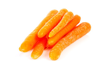 Pile of raw carrots over white background