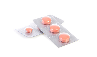 malaria pills over white background