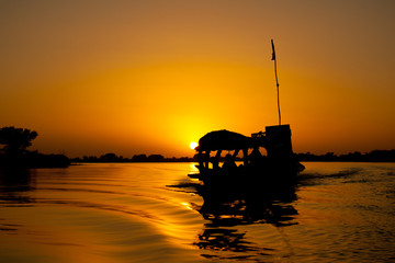 Pirogue at sunset, Mali (Africa).