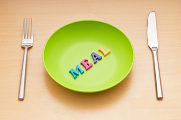 Plate with letters on the white background