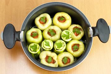 pan with stuffed peppers and zucchini
