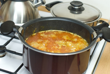 Rice, meat carrots and spices, cooking Uzbek pilaf.