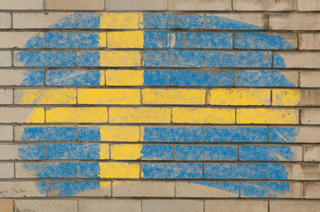 flag of Sweden on grunge brick wall painted with chalk