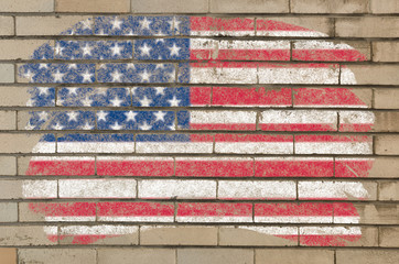 flag of USA on grunge brick wall painted with chalk