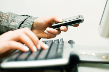 Female hands working on computer
