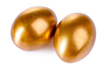 golden eggs isolated on white