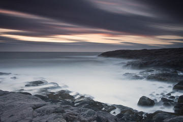 Fototapeta na wymiar Northern seaside on the sunset