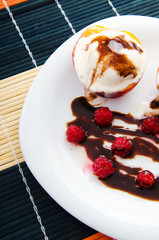 Ice cream served with berries