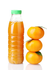 Tangerines and juice bottle isolated on white