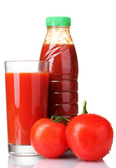 Tomato juice in glass, bottle and tomato isolated on white