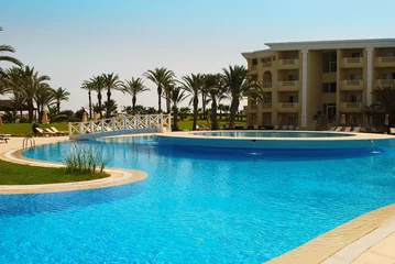  Luxury Resort Pool and hotel garden in Tunisia. © maxkateUSA