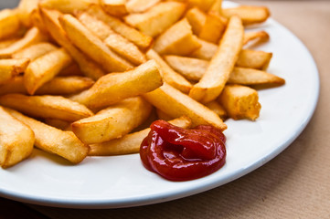 Golden French fries potatoes ready to be eaten