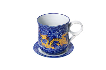 Porcelain saucer and cup  with a dragon pattern