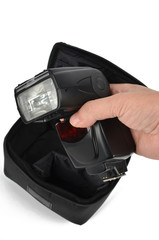 Fototapeta premium Camera flash and bag