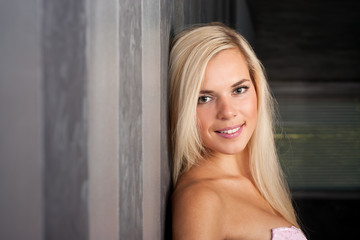 Fototapeta premium Pretty young model with beautiful blond hair