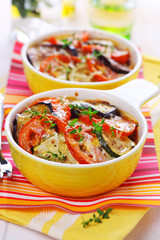 Vegetable casserole with cheese on white background