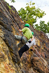 Cliff abseiling recreation in Thailand