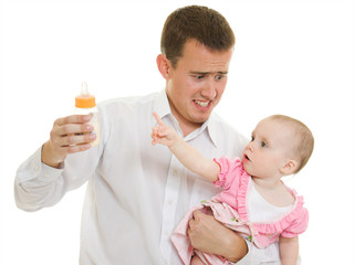 A young father with a baby on a white background.