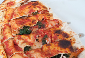 calzone pizza on paper