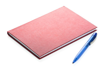 pen over red diary