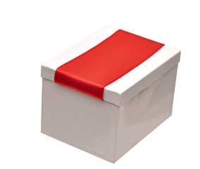 A wrapping red ribbon gift on white