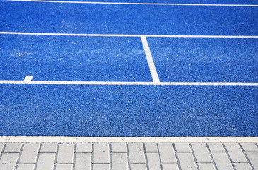 Fototapeta premium Tartanbahn Blau Detail